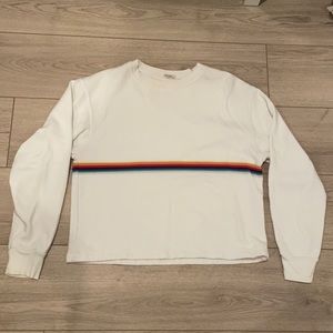 white long sleeve with rainbow pattern
